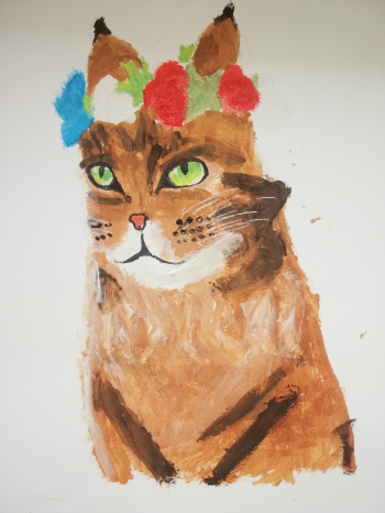 Michalina Bukowska 6a namalowała kota w wianku z kwiatów